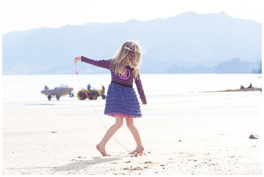 Girl dancing on beach